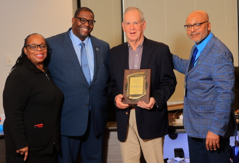 Trustee Jacquelyn Price Ward, Executive Director Carlton Lenoir, Sr. and President Jeffery Blackwell presenting Trustee Mary Sharon Reilly's Family with a distinguished service award mary sharon reilly.jpg
